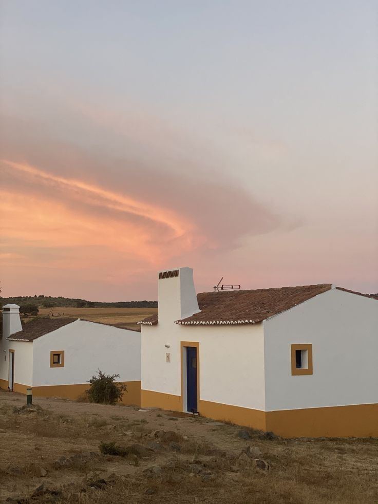 Whitewashed farmhouses under a soft dusk sky, Alentejo