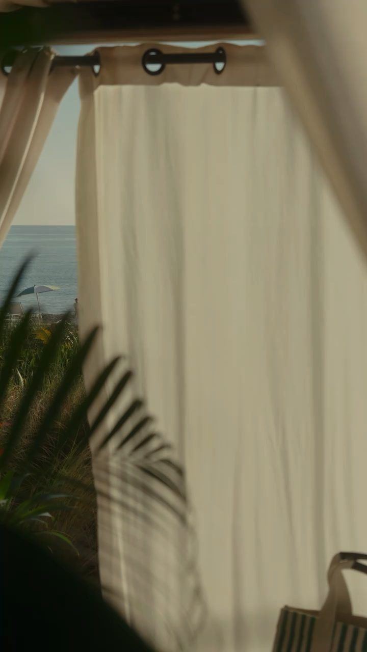 Linen curtain opening onto the Atlantic